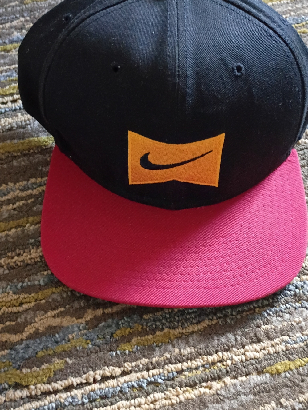 Nike SB Pennant Black & Red Snapback Hat with Gold Logo Patch